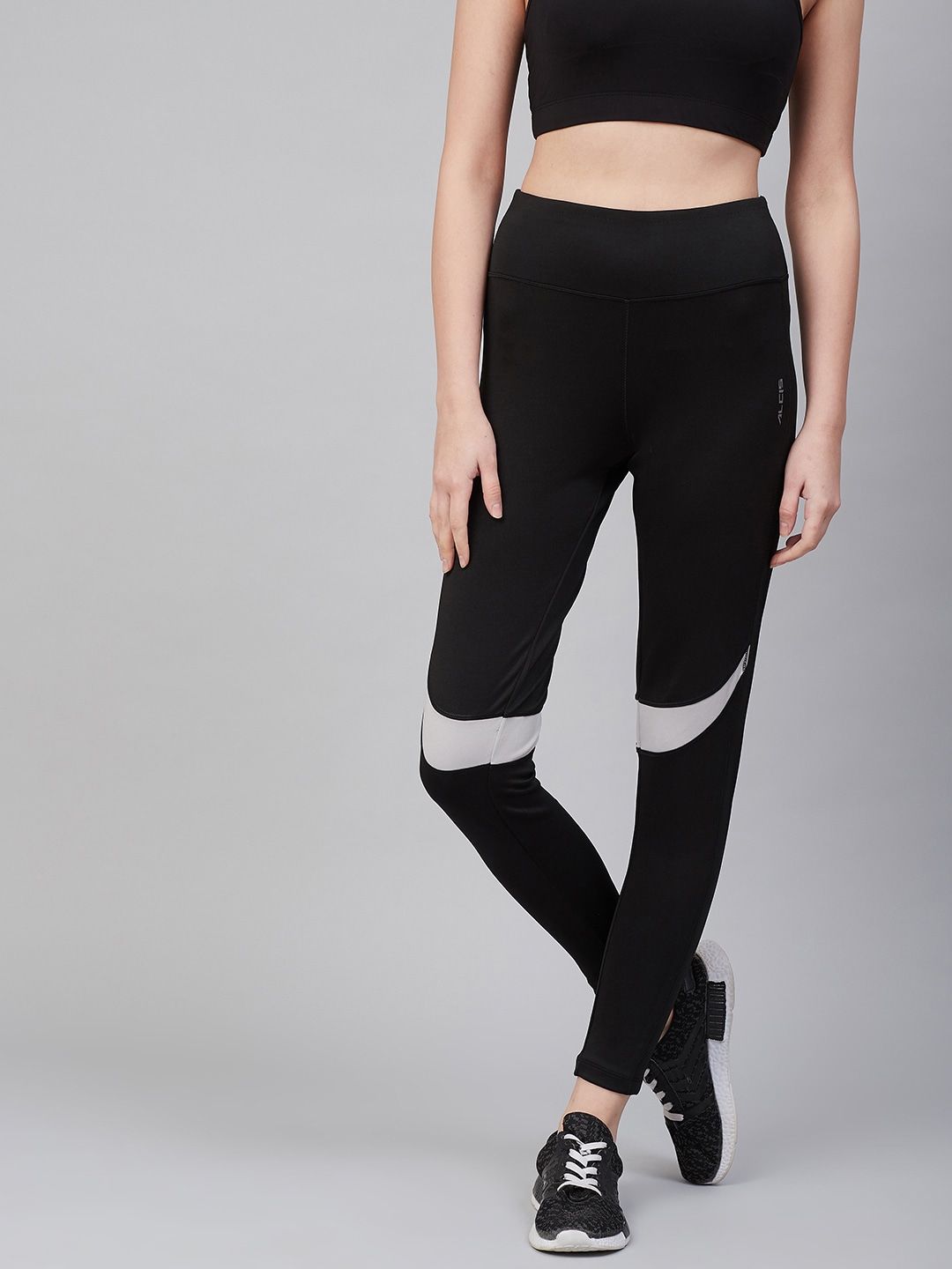 Alcis Women Black Solid Training Tights Price in India