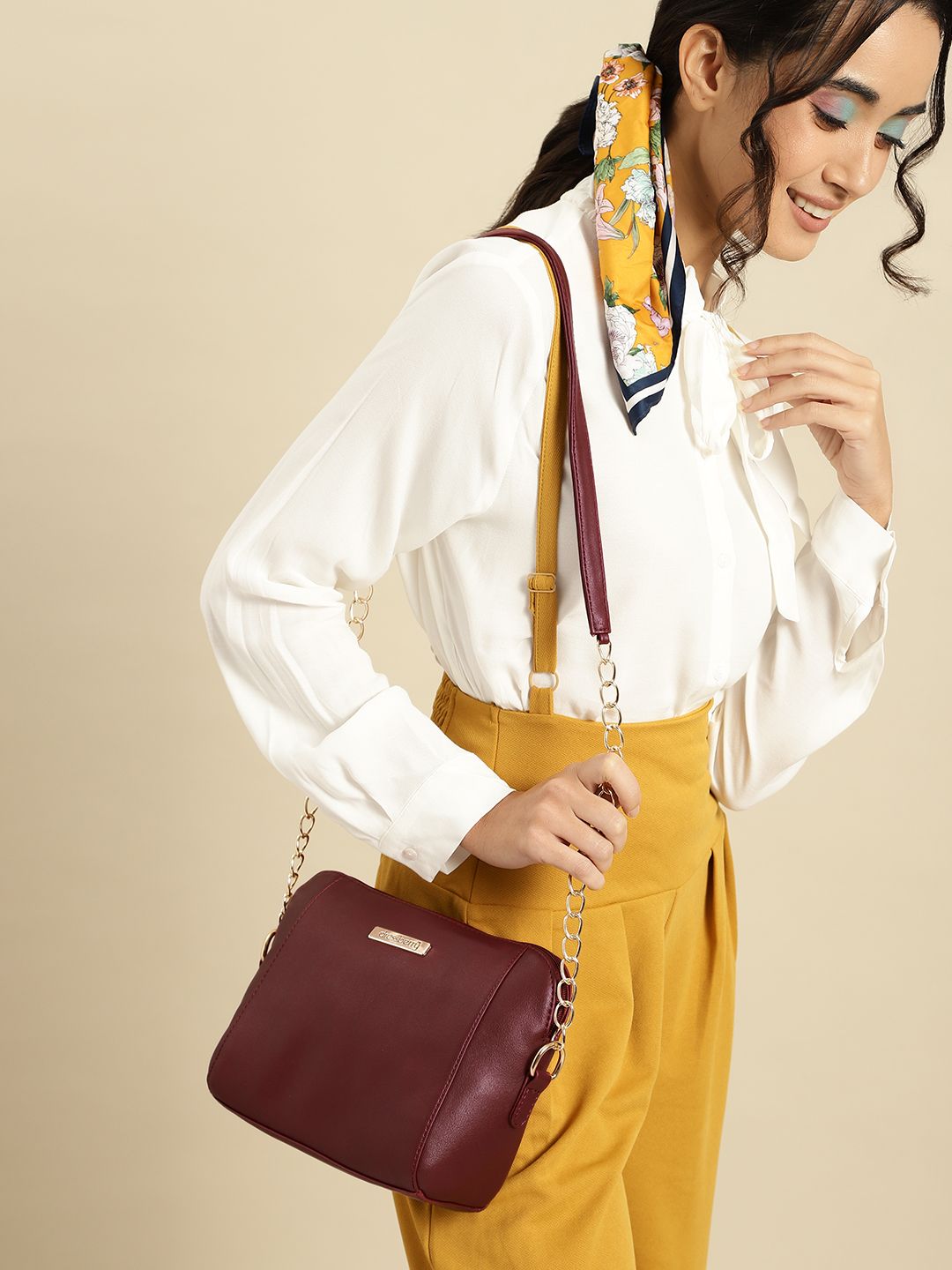 DressBerry Burgundy Solid Sling Bag Price in India