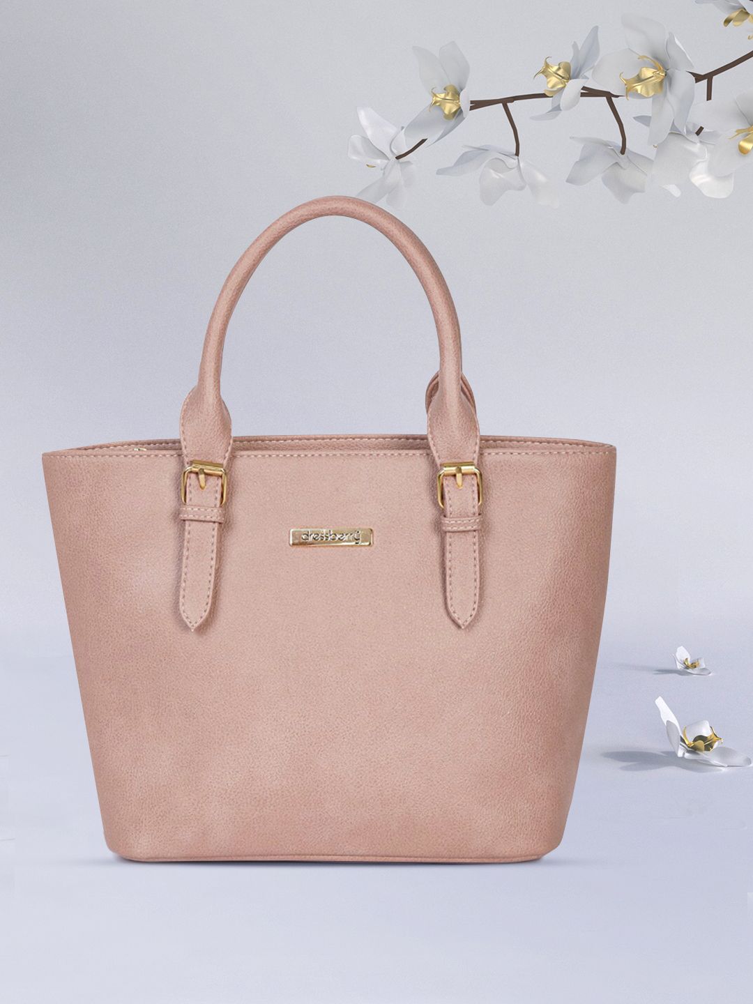 DressBerry Peach-Coloured Solid Handheld Bag Price in India
