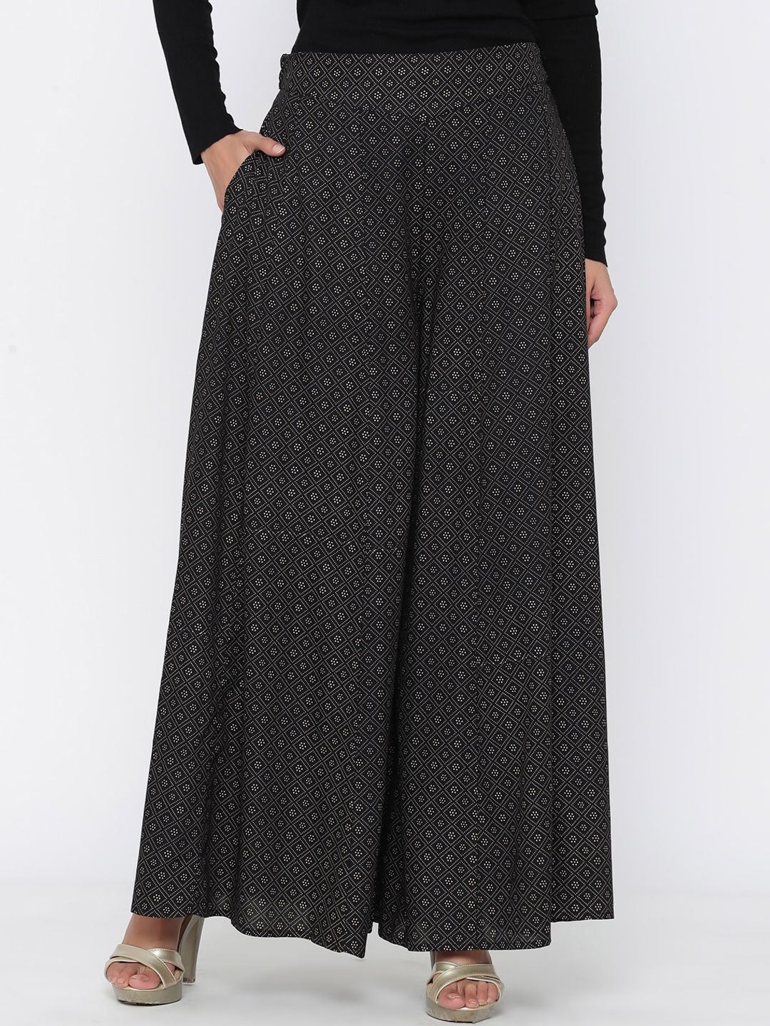 Juniper Women Black & Gold-Toned Printed Flared Palazzos Price in India
