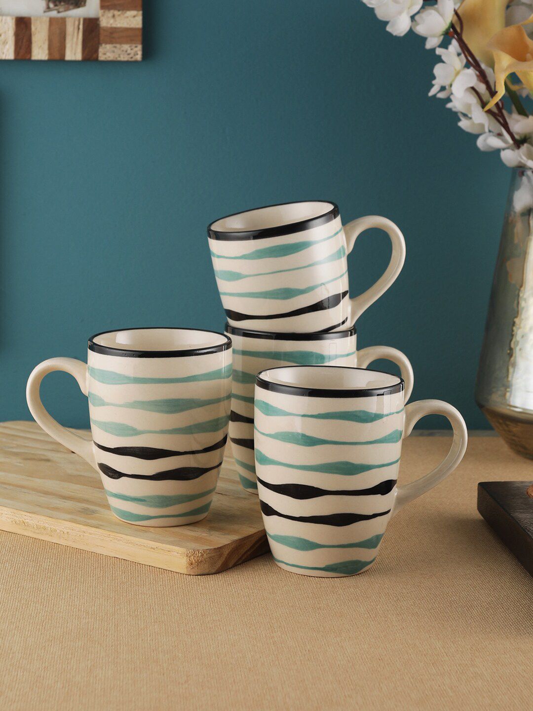 VarEesha Off-White & Blue 4-Pieces Printed Ceramic Mugs Set 220 ml each Price in India