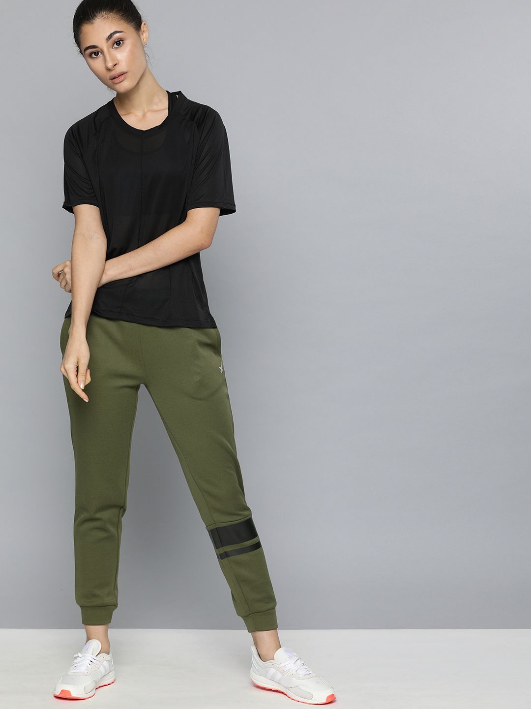 HRX by Hrithik Roshan Women Burnt Olive Solid Slim Fit Rapid-Dry Training Joggers Price in India