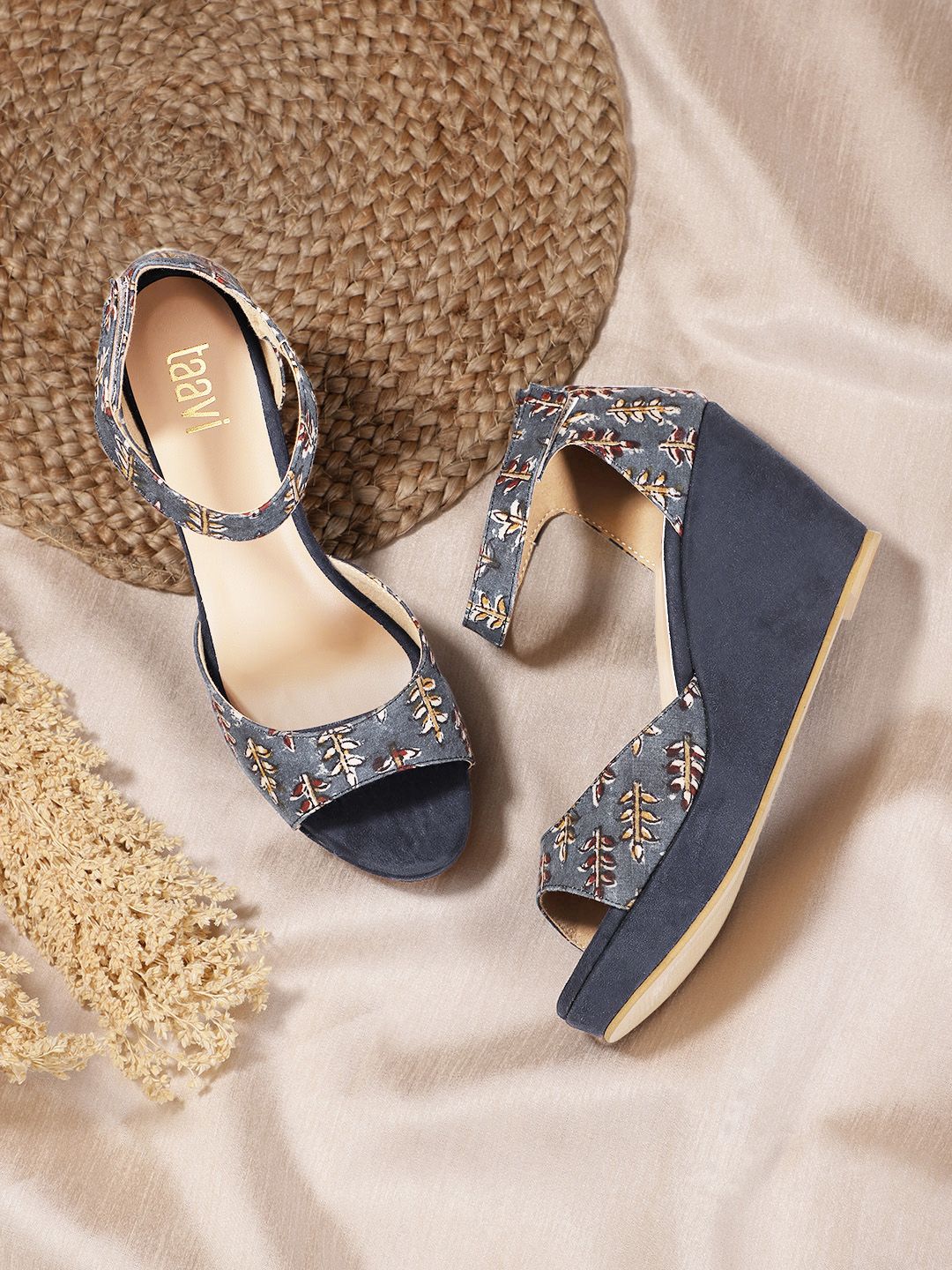 Taavi Women Blue & Maroon Leaf Print Wedges Price in India