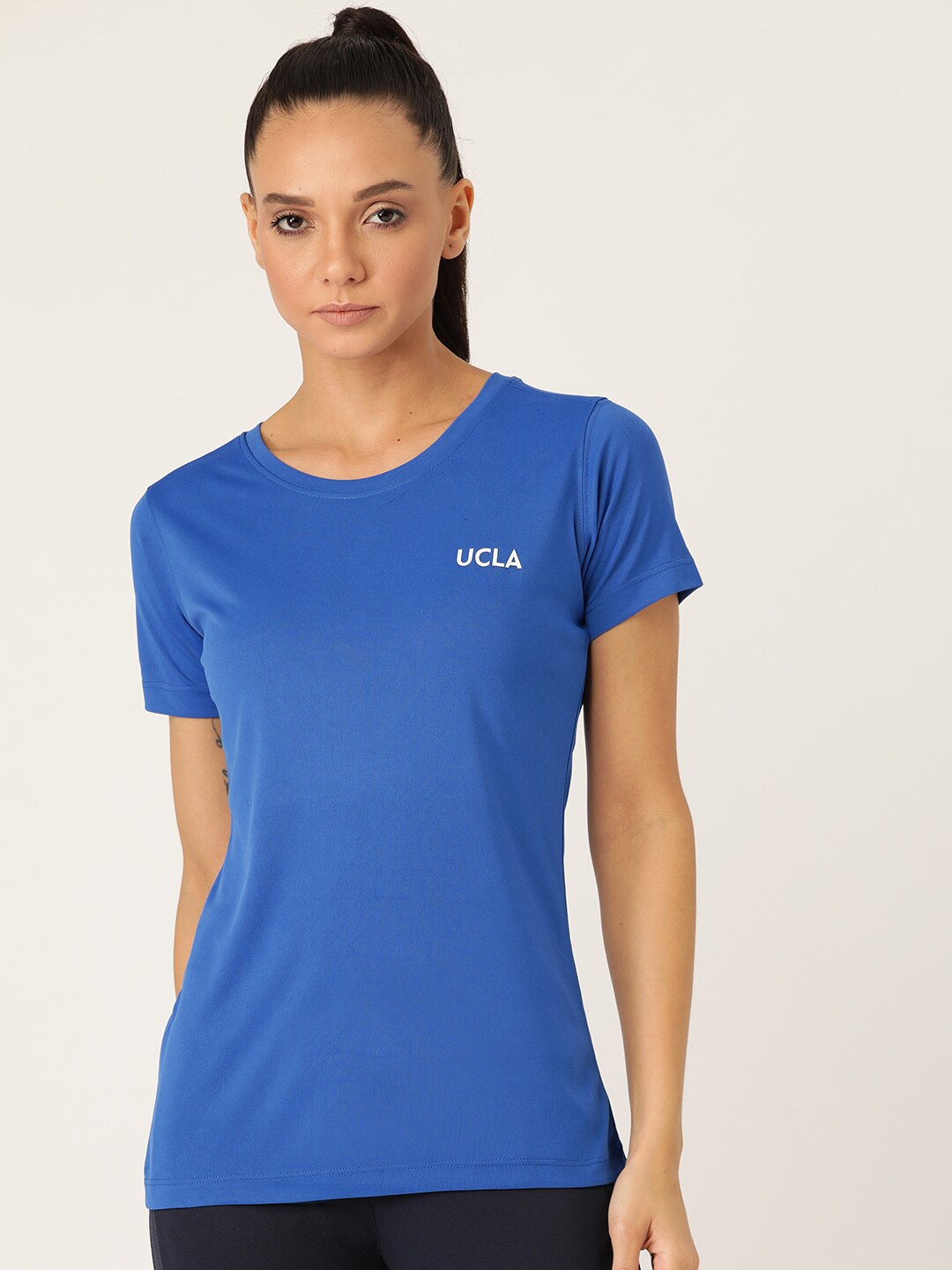 UCLA Women Blue Solid Round Neck T-shirt Price in India