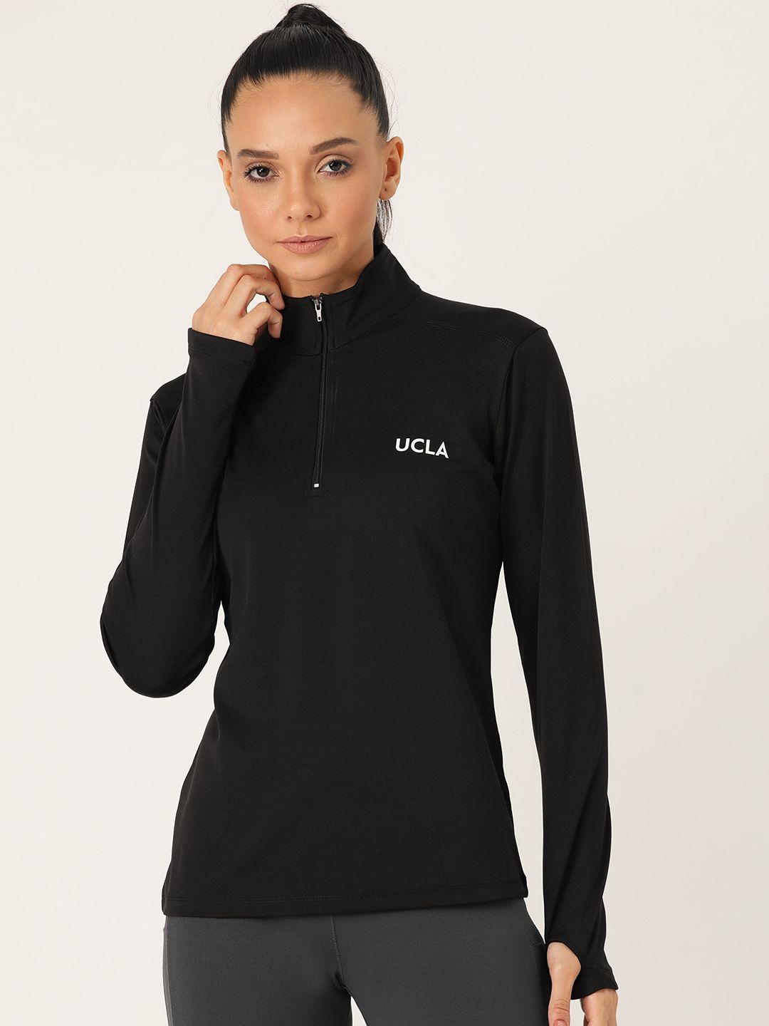 UCLA Women Black Solid Mock Collar T-shirt Price in India
