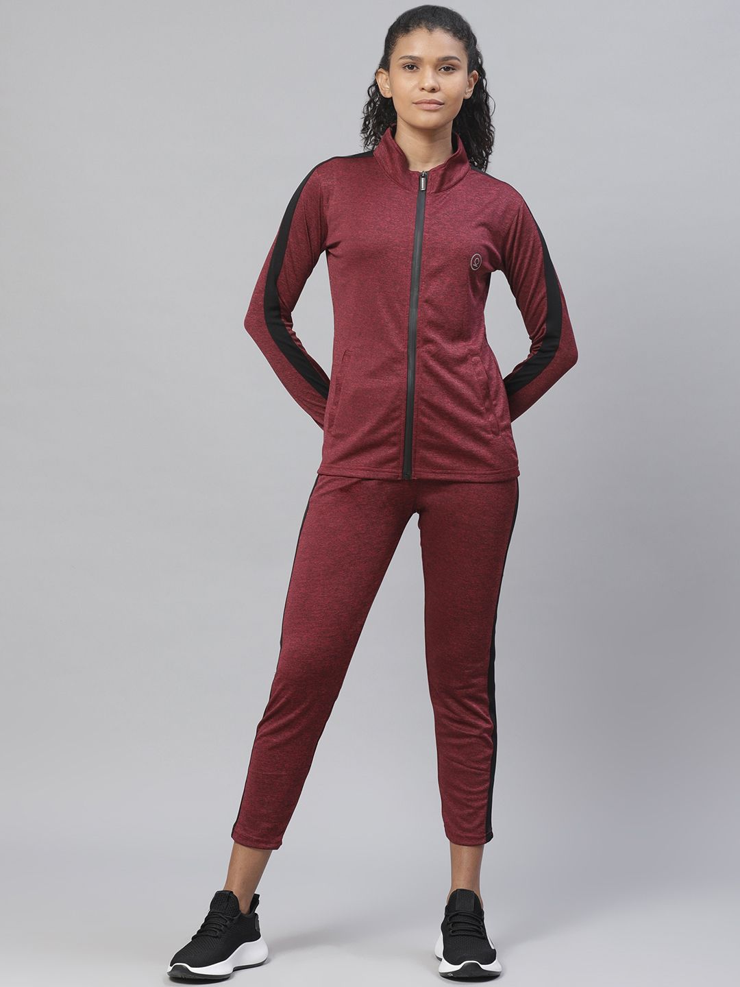 Chkokko Women Rust Red Solid Training Tracksuit Price in India