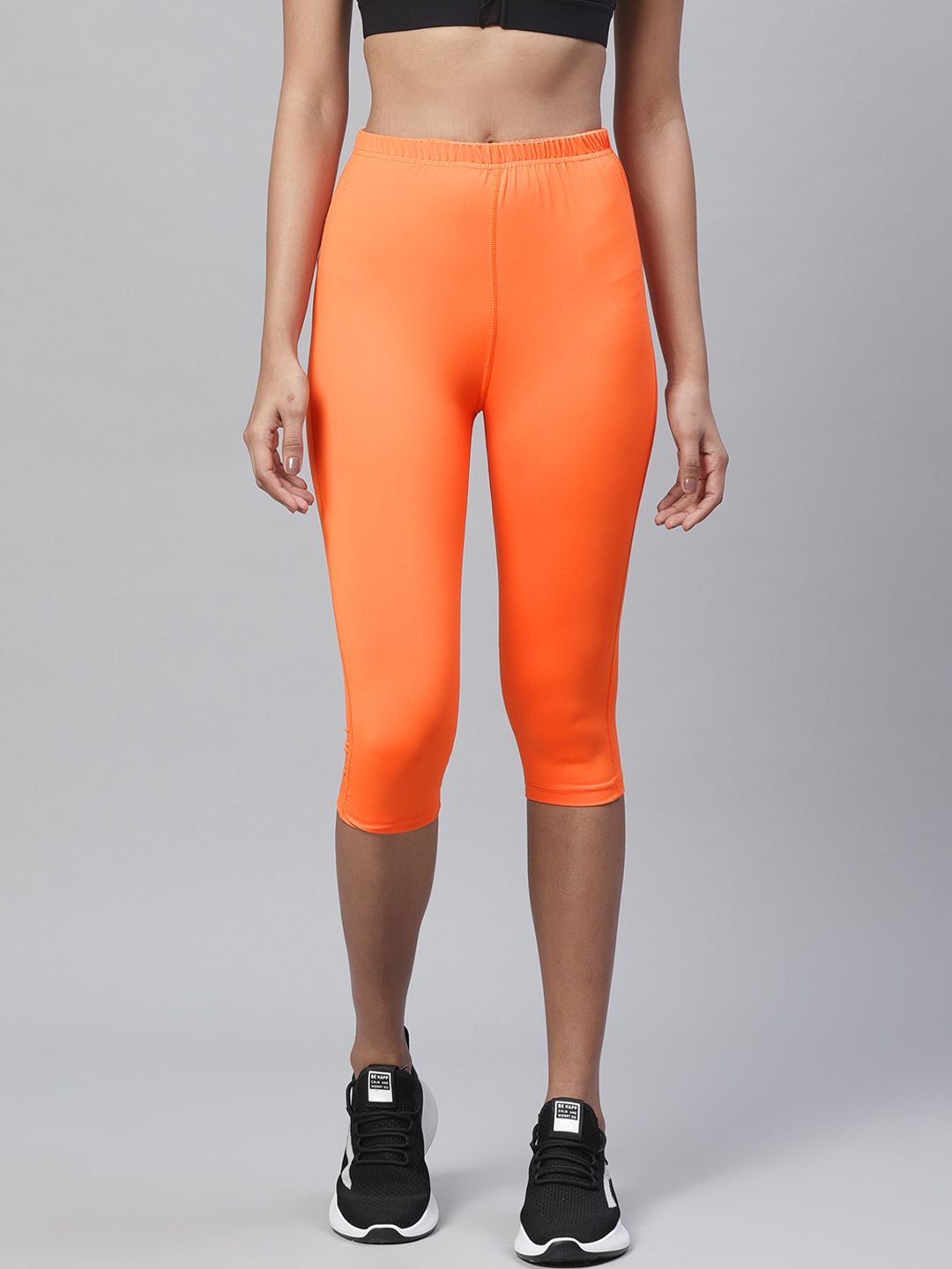 Chkokko Women Orange Solid 3/4th Training Tights Price in India