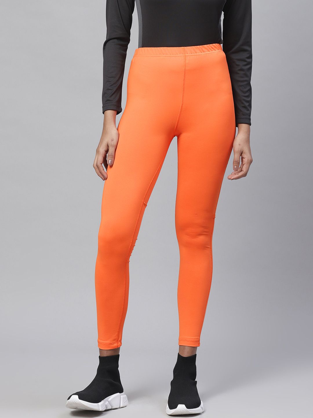 Chkokko Women Orange Solid Cropped Yoga Tights Price in India