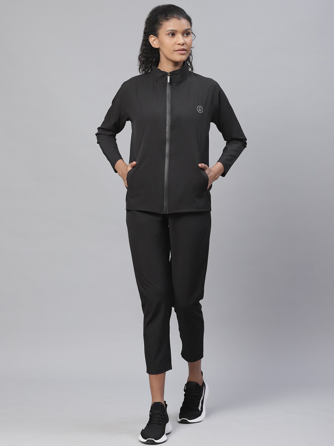 Chkokko Women Black Solid Gym Tracksuit Price in India