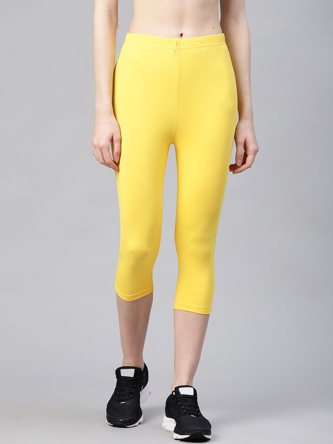 Chkokko Women Yellow Solid Yoga Tights Price in India