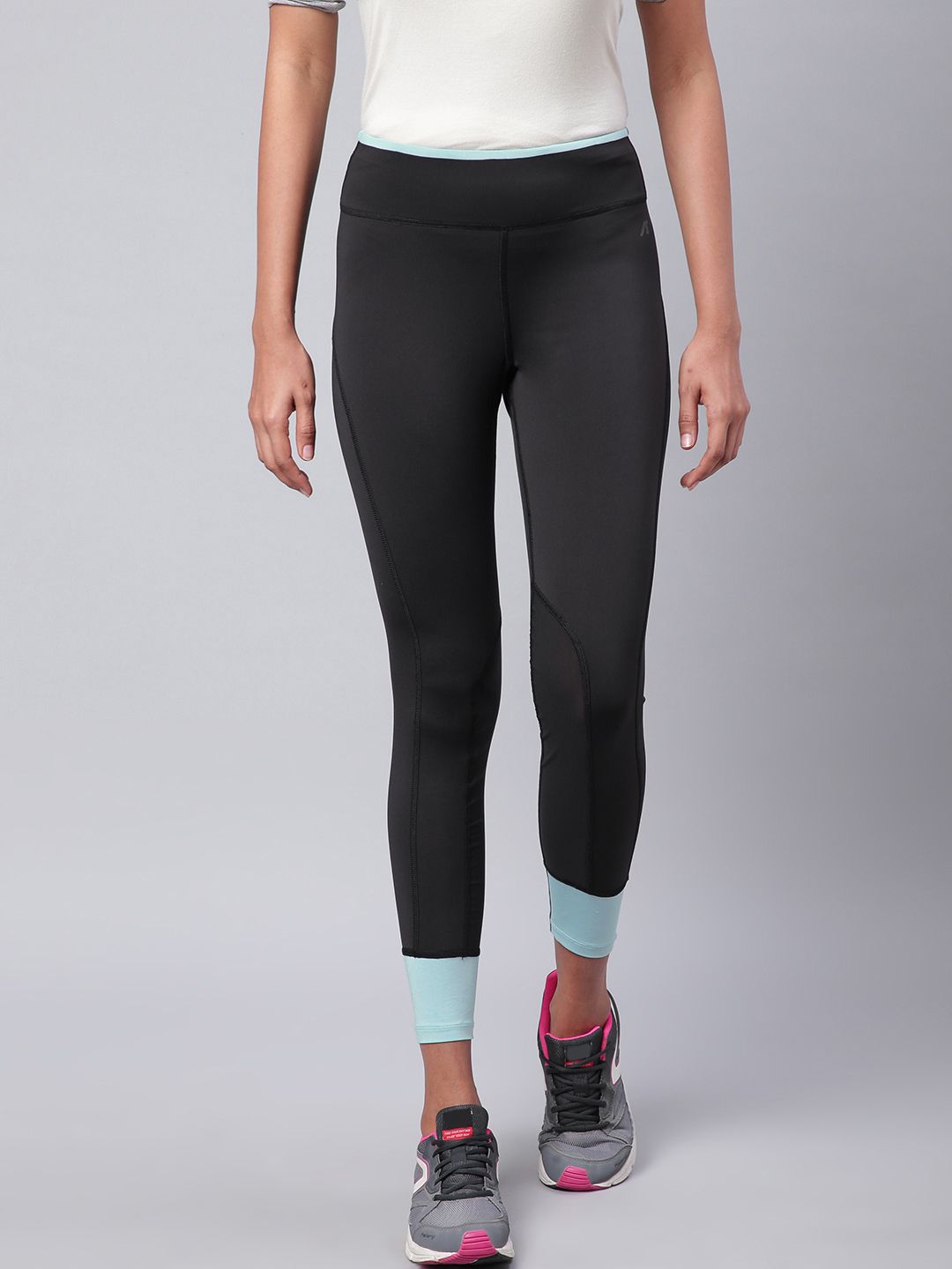 Alcis Women Black Solid Training Tights Price in India