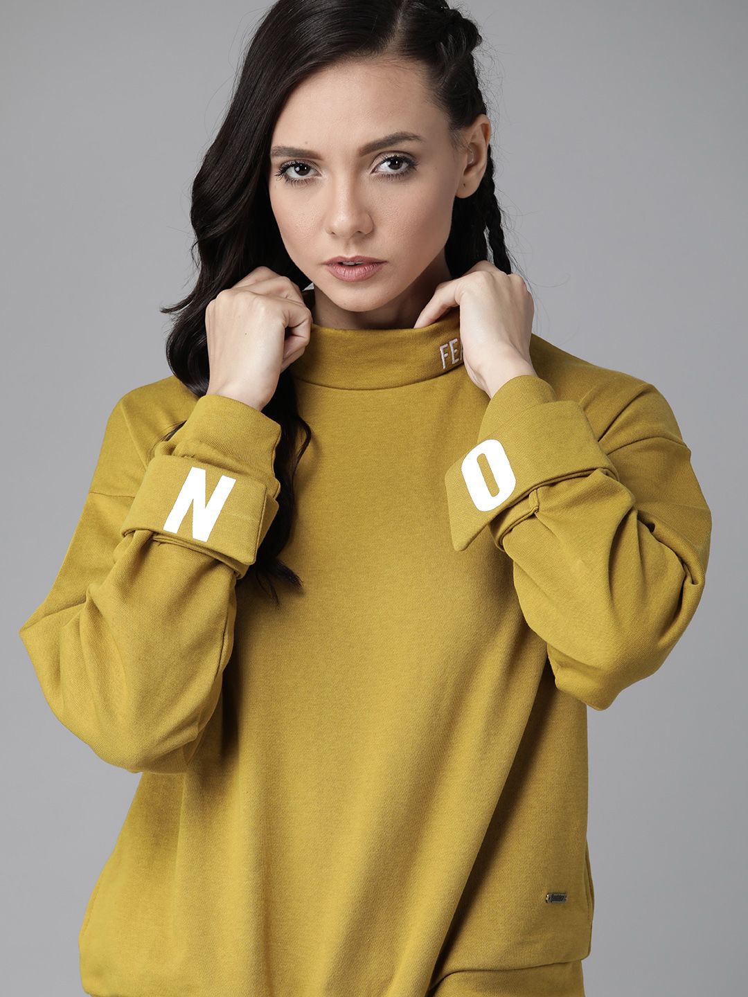 Roadster Women Mustard Yellow Solid Sweatshirt Price in India