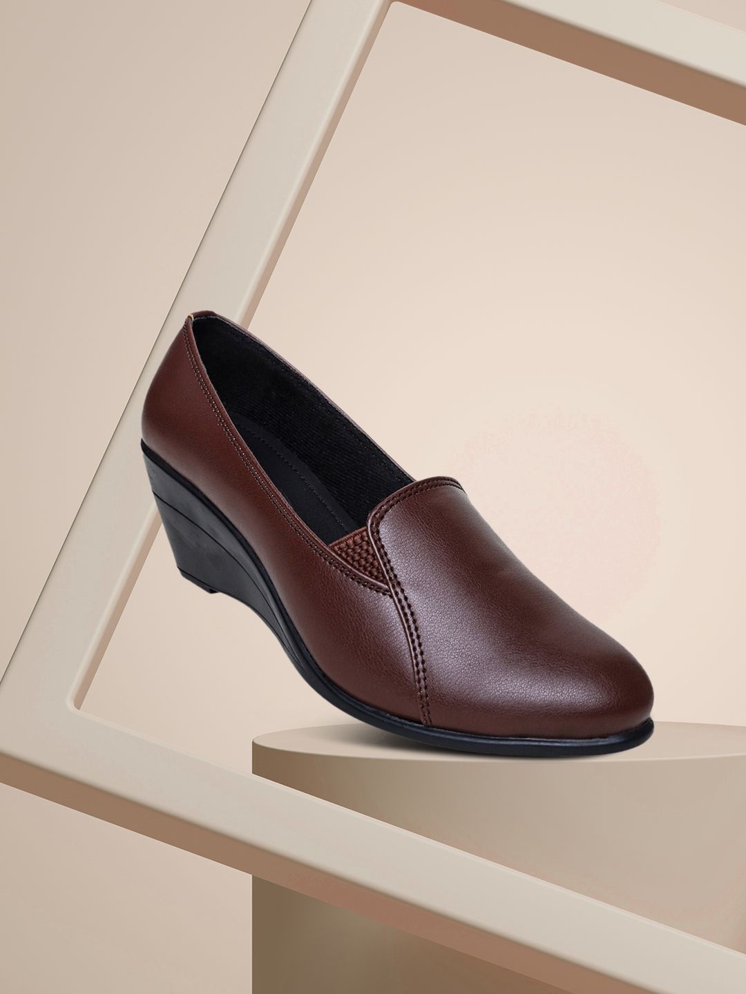 VALIOSAA Women Brown Solid Pumps Price in India