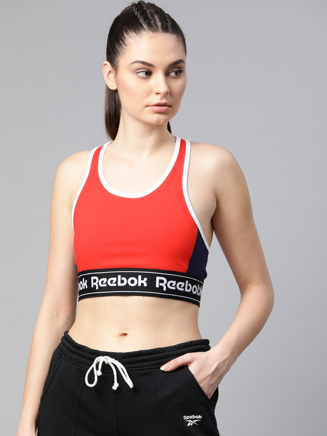 Reebok Women Red Solid Training Essentials Linear Logo Low-Impact Workout Bra Price in India