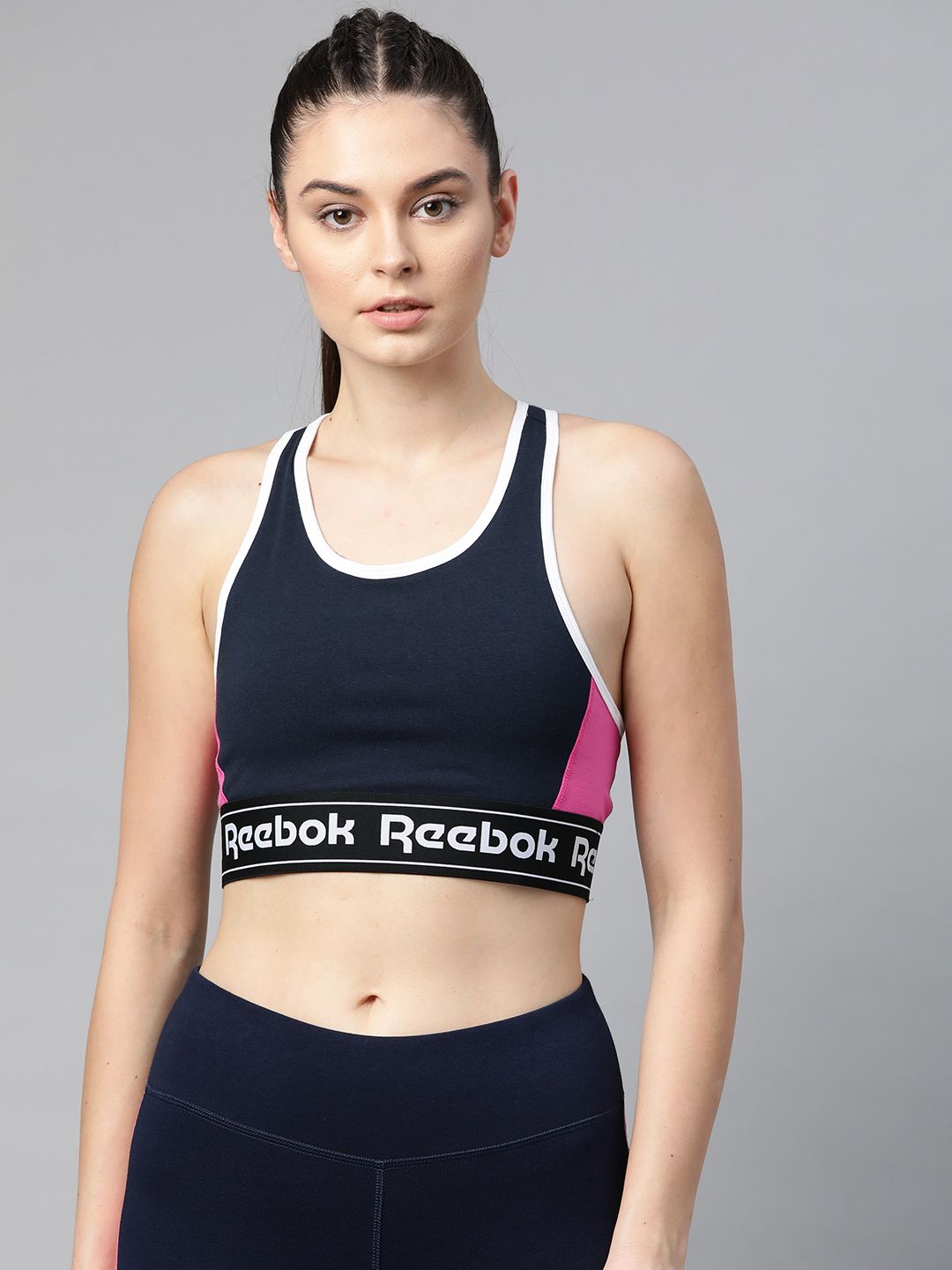 Reebok Women Navy Blue Solid Training Essentials Linear Logo Low-Impact Workout Bra Price in India
