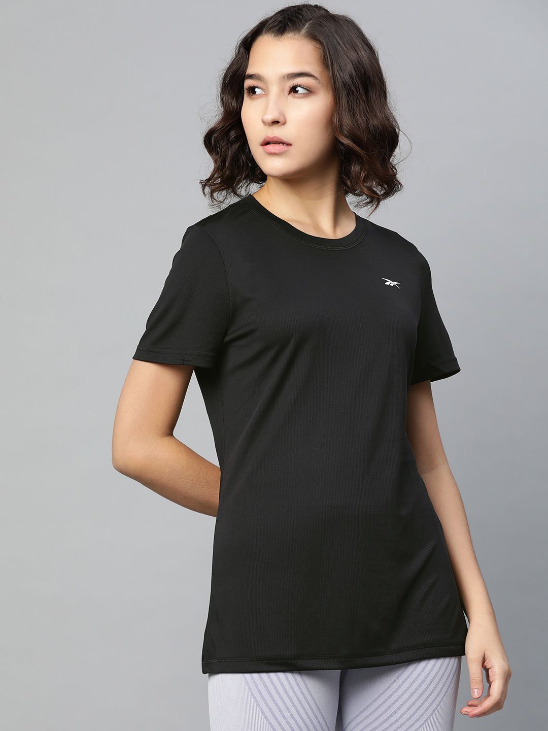 Reebok Women Black Slim Fit Solid Training T-shirt Price in India