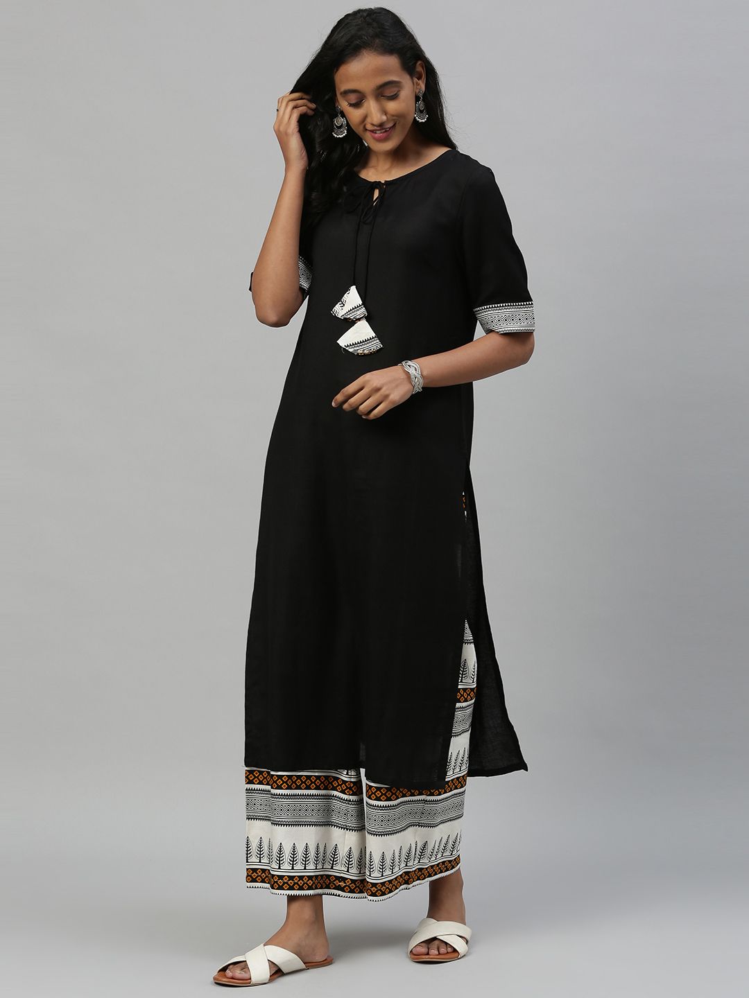 Anouk Women Black Solid Kurta with Palazzos