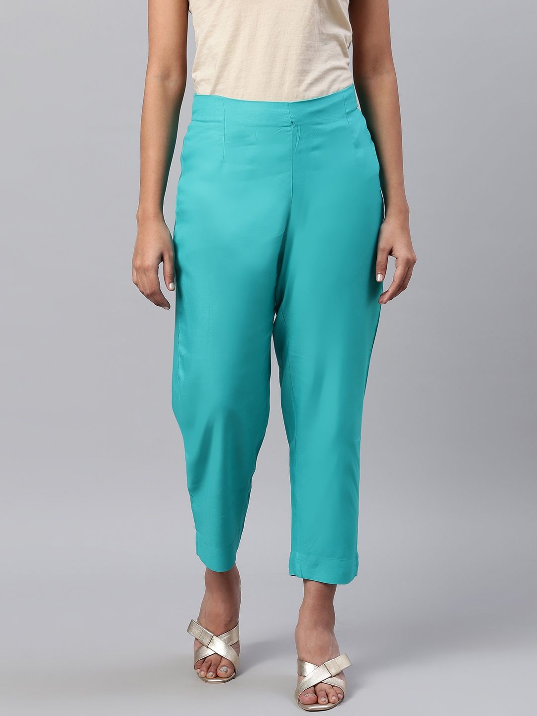 KSUT Women Green Regular Fit Solid Trousers Price in India