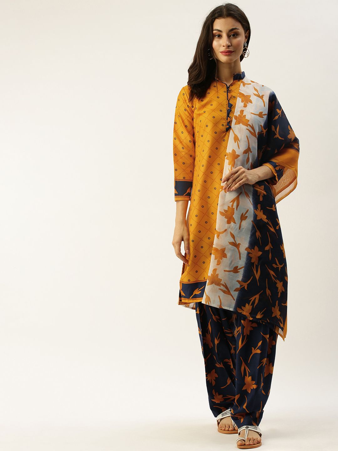 Rajnandini Mustard Yellow & Navy Blue Cotton Blend Printed Unstitched Dress Material Price in India