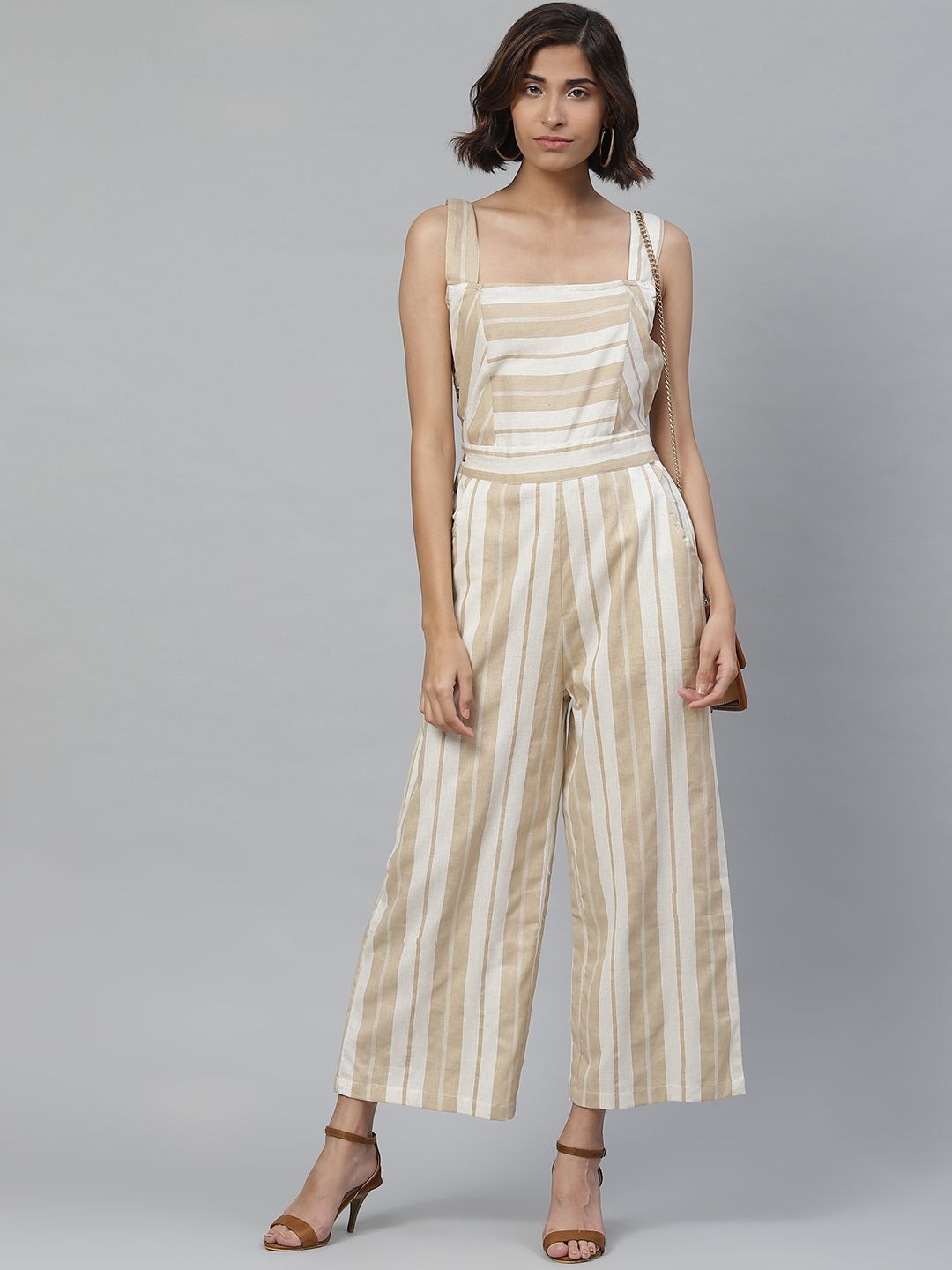 Yuris Women Beige & Off-White Striped Basic Jumpsuit Price in India