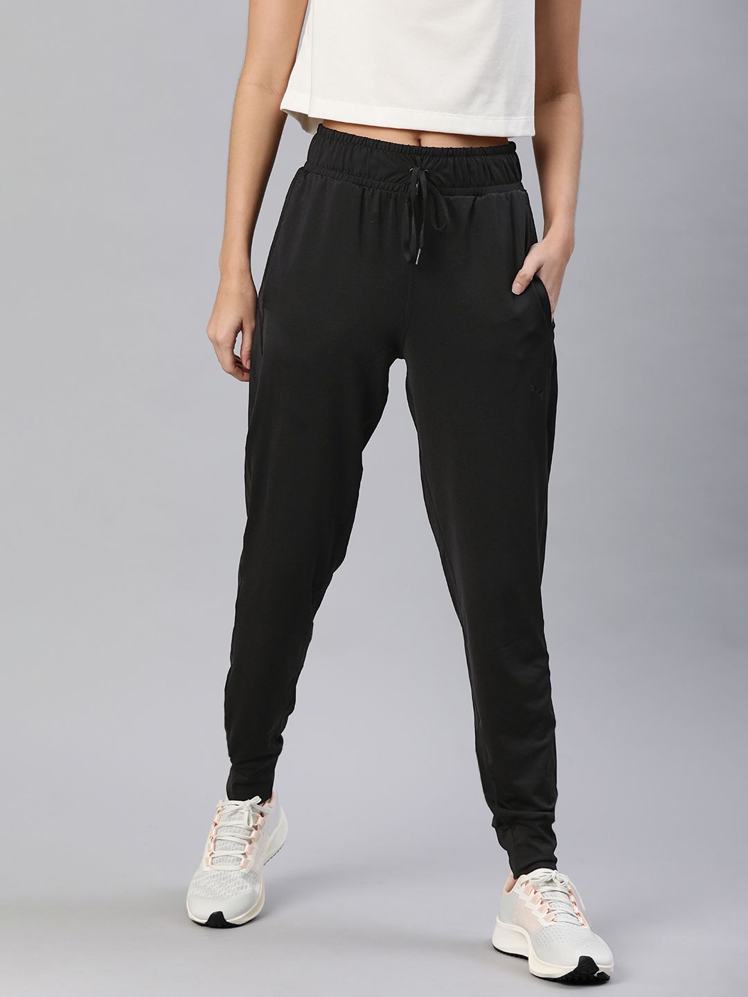 Puma Women Black Solid Straight Fit Studio Knit Yoga Joggers Price in India