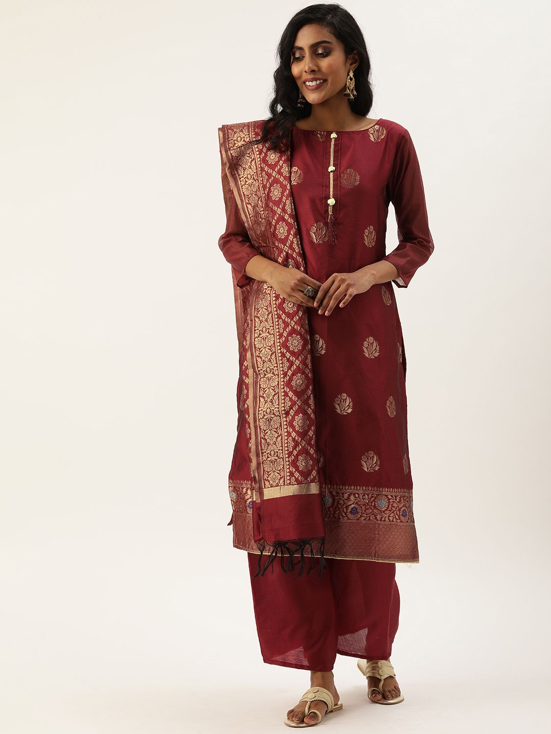 Rajnandini Maroon & Golden Silk Blend Unstitched Dress Material Price in India