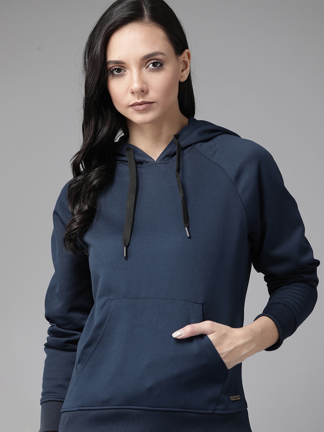 Roadster Women Navy Blue Solid Hooded Sweatshirt Convertible Into a Bag Price in India