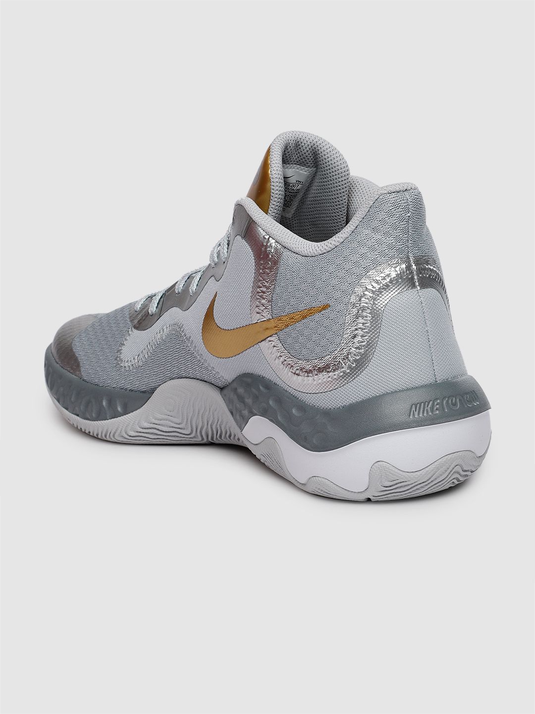nike grey and gold shoes