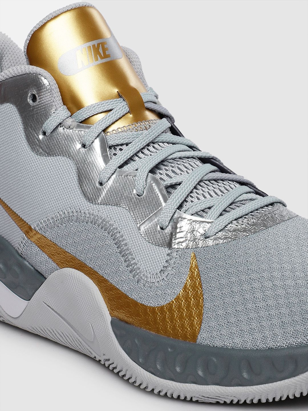 grey and gold basketball shoes
