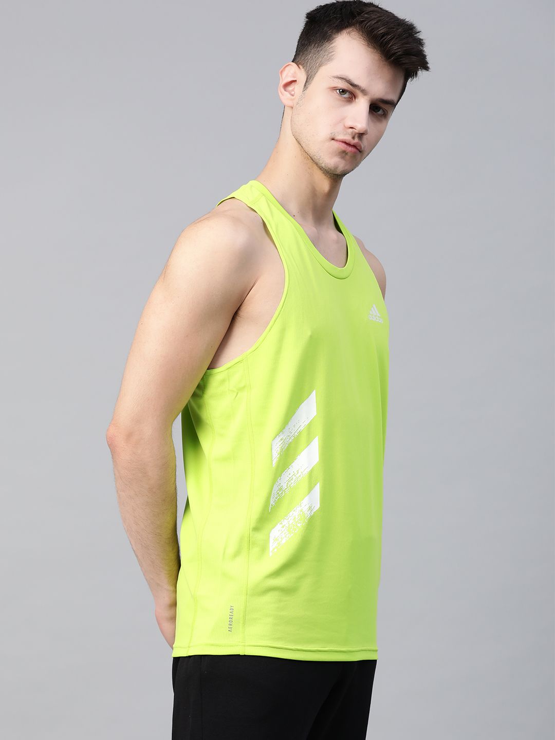 vest own the run singlet