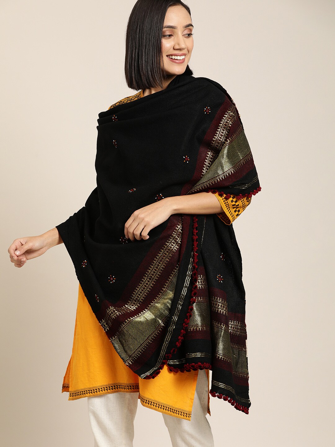 Taavi Women Black & Gold-Coloured Embroidered Bhujodi Shawl With Tassels Price in India