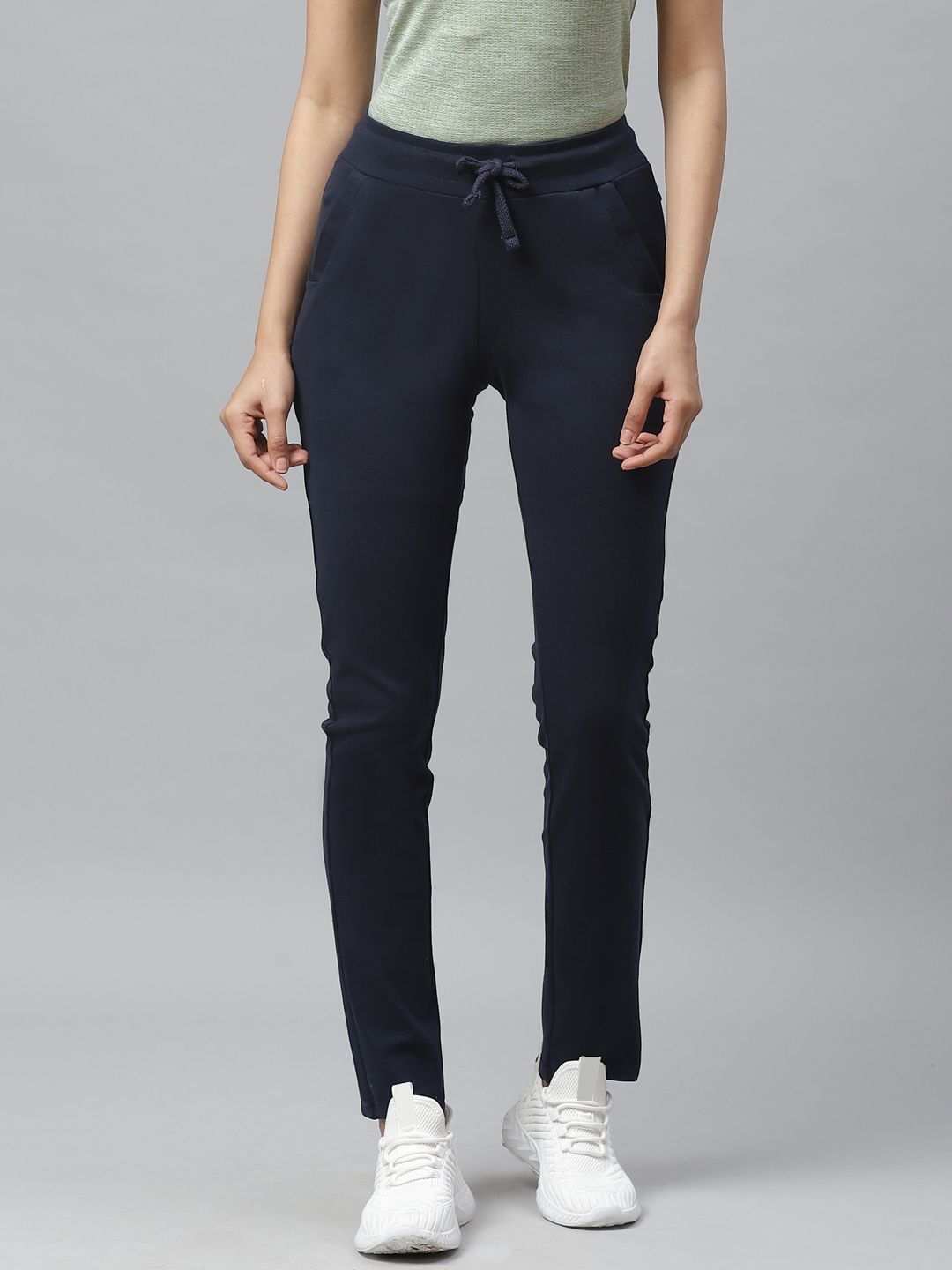 Cayman Women Navy Blue Solid Track Pants Price in India