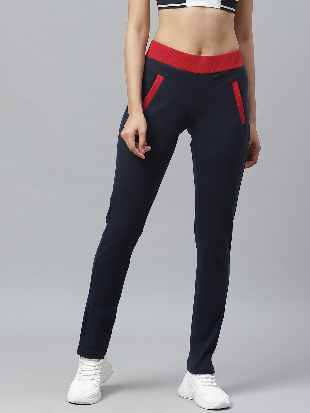 Cayman Women Navy Blue Solid Track Pants Price in India