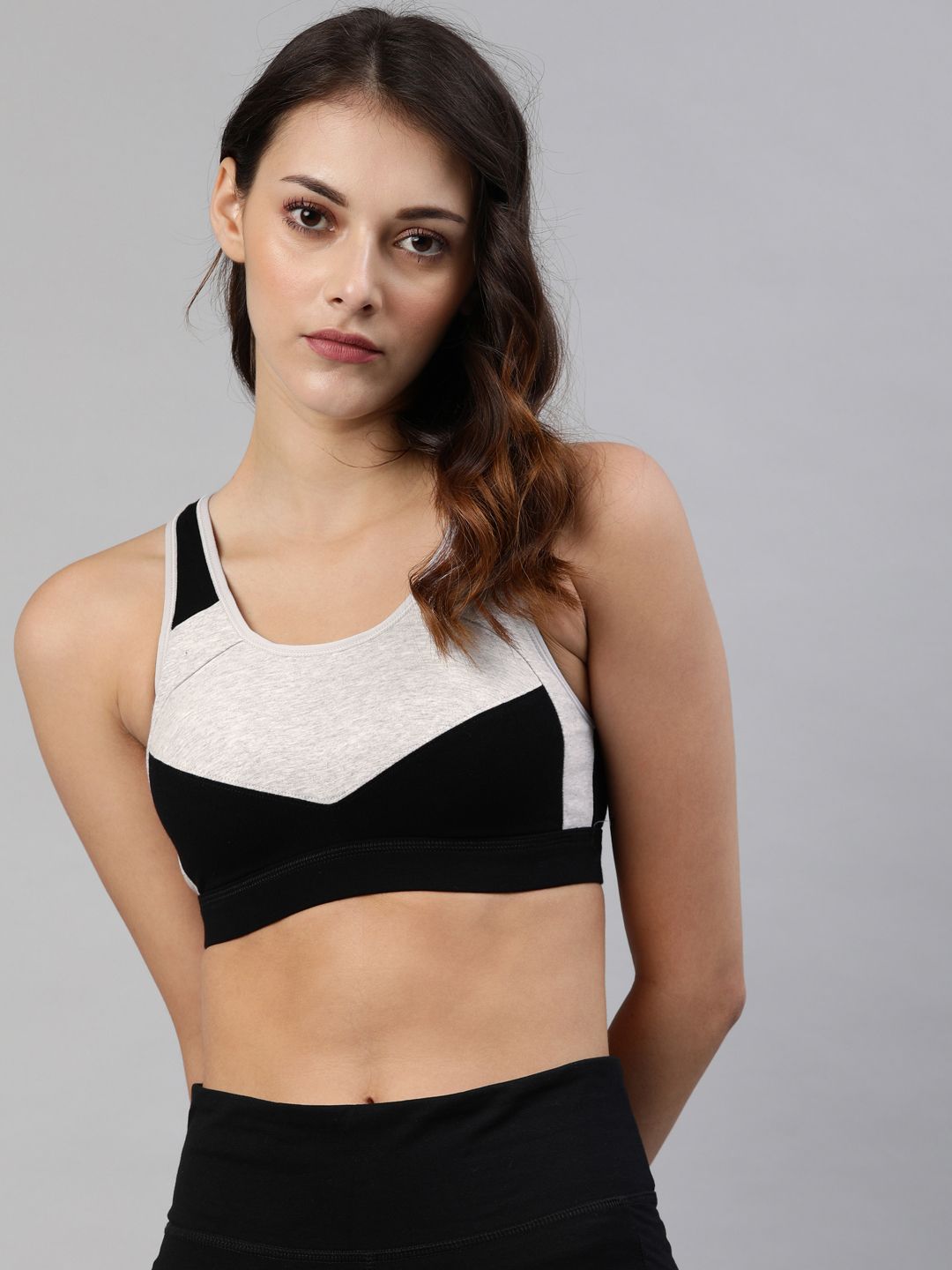 Van Heusen Black & White Colourblocked Non-Wired Lightly Padded Workout Bra Price in India
