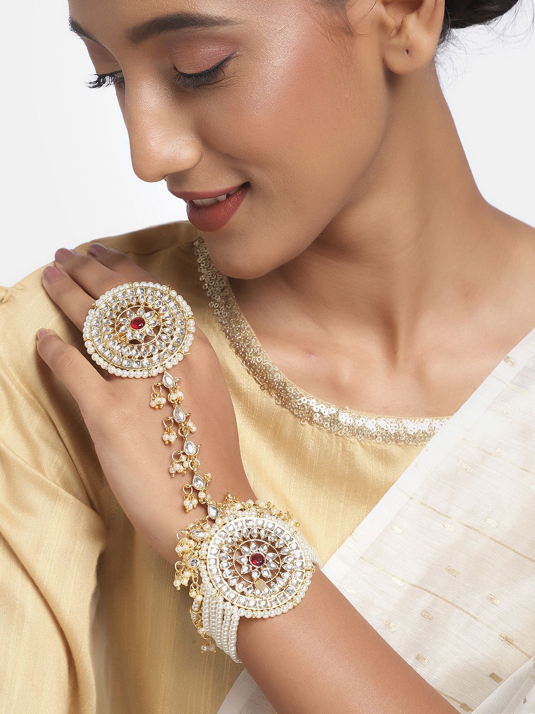 Zaveri Pearls Gold-Toned & White Kundan & Pearls Studded Ring Bracelet Price in India