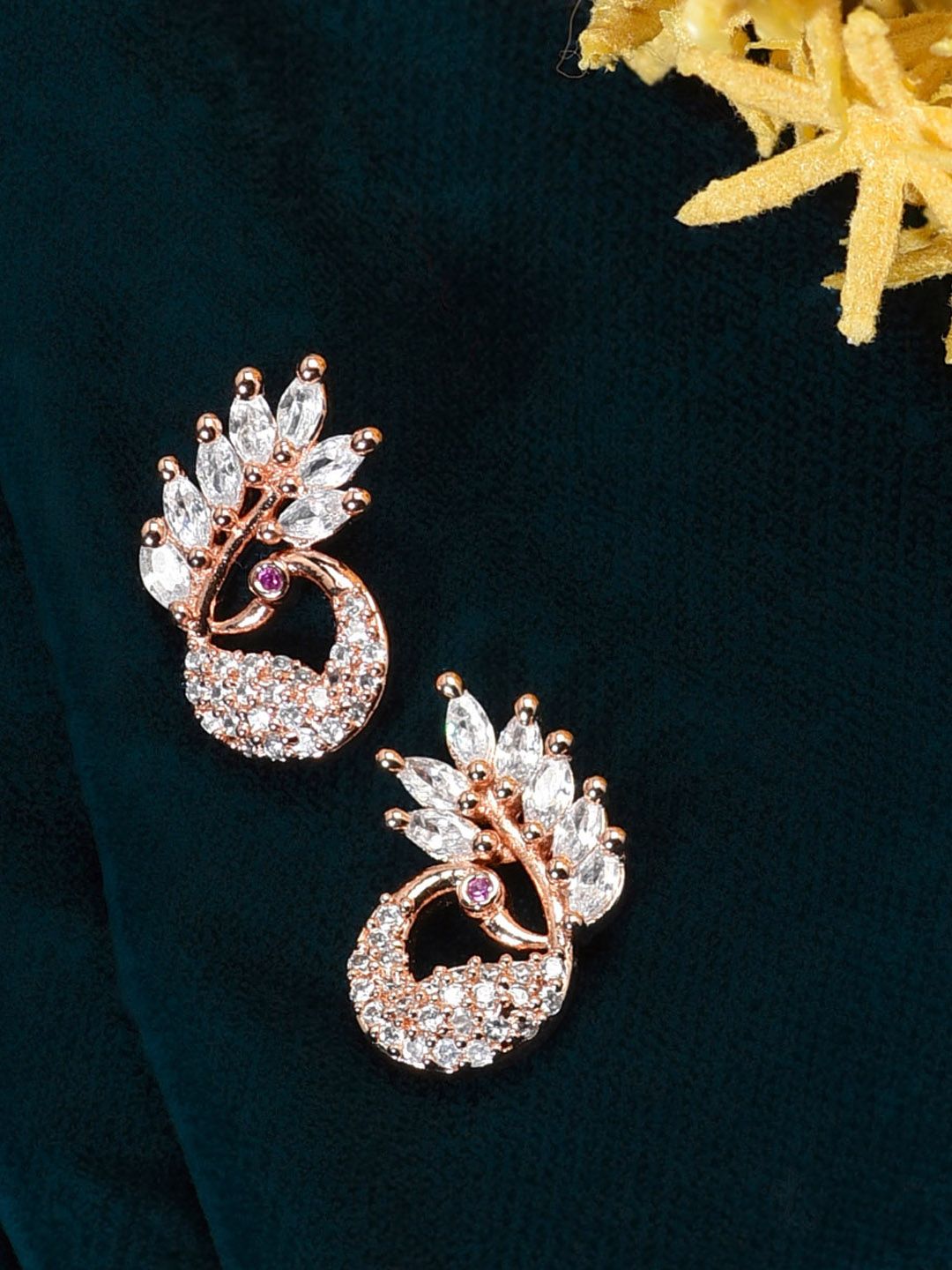 Zaveri Pearls Rose Gold-Toned & White Cubic Zirconia Studded Peacock Shaped Studs Price in India