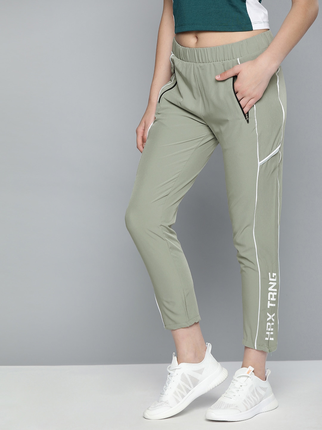 HRX by Hrithik Roshan Women Beige Solid Track Pants Price in India