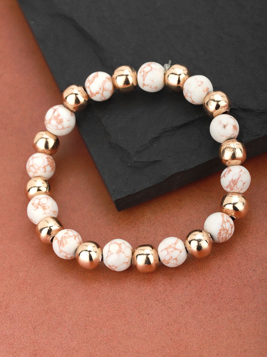 Carlton London Gold-Toned & White Beaded Elasticated Bracelet Price in India