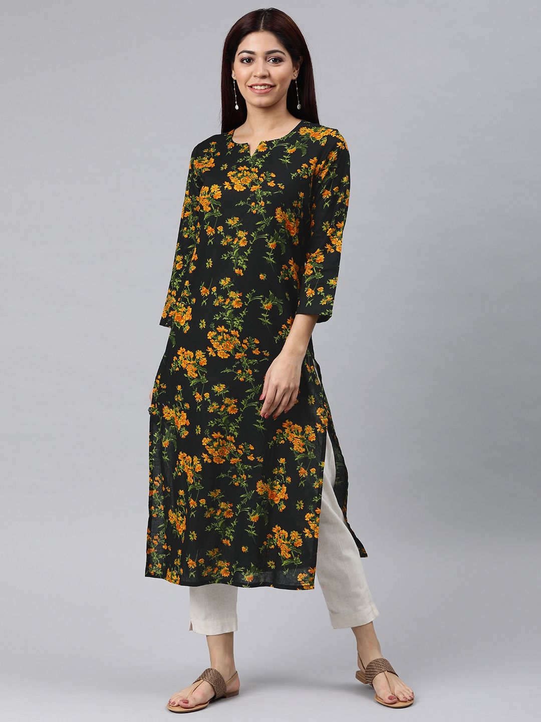 AHIKA Women Black & Yellow Floral Printed Straight Kurta Price in India