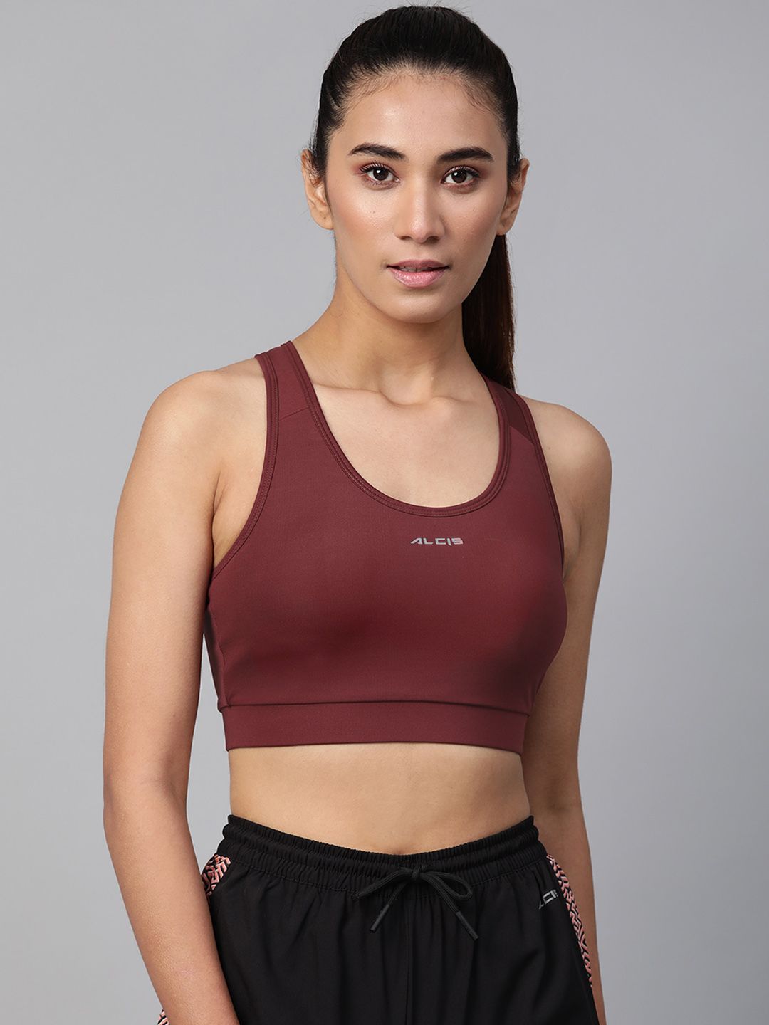 Alcis Maroon Solid Non-Wired Lightly Padded Workout Bra ECWBTAW2000412 Price in India