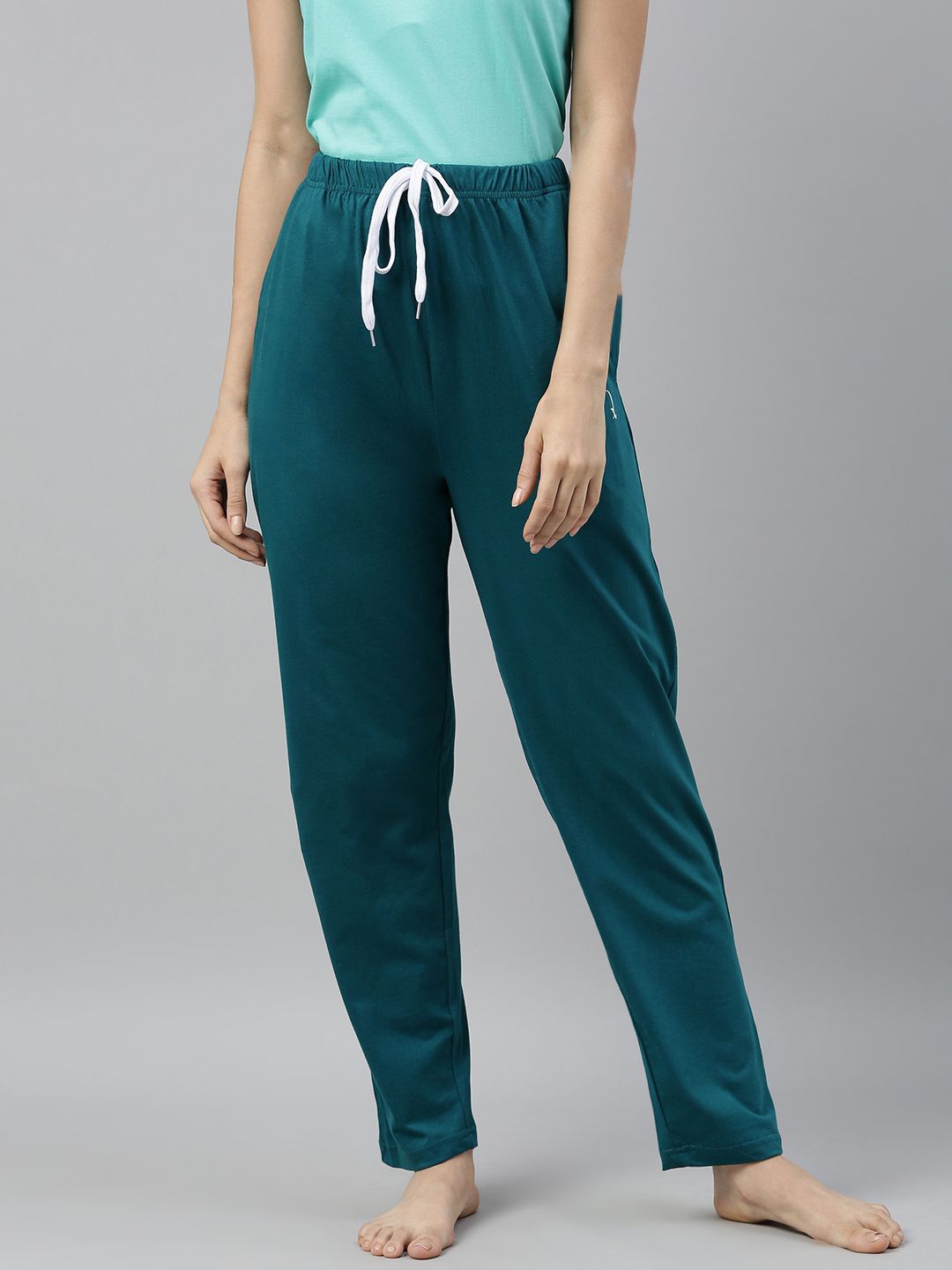 QUARANTINE Women Teal Green Solid Lounge Pants Price in India