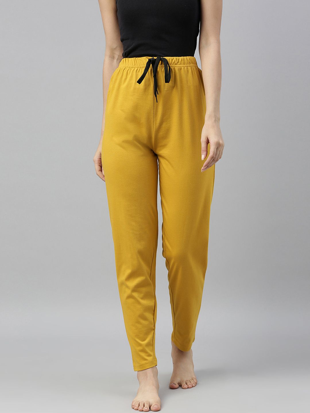 QUARANTINE Women Mustard Yellow Solid Lounge Pants Price in India