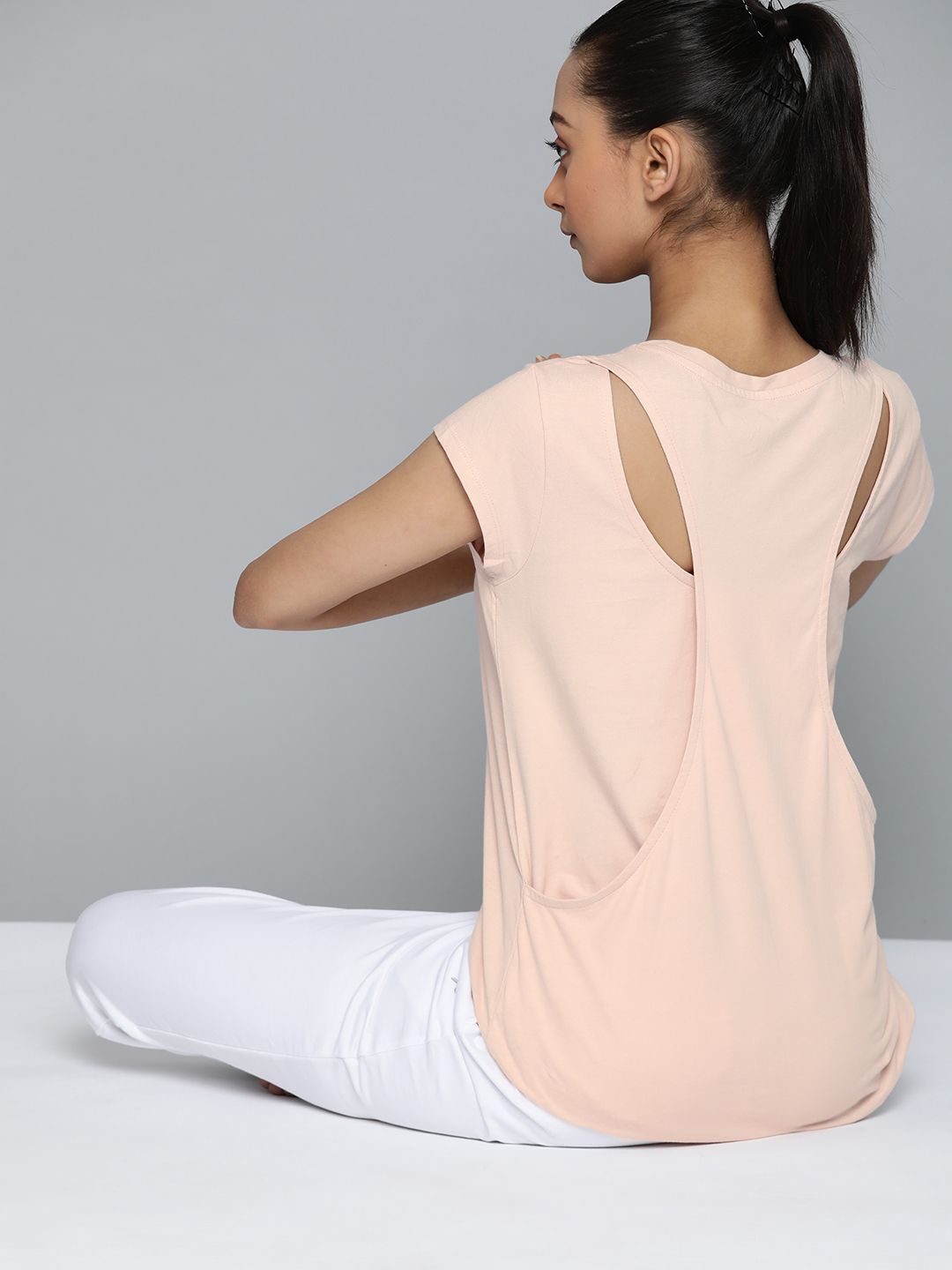 HRX By Hrithik Roshan Women Peach Whip Solid Organic Cotton Antimicrobial Yoga Tshirt Price in India