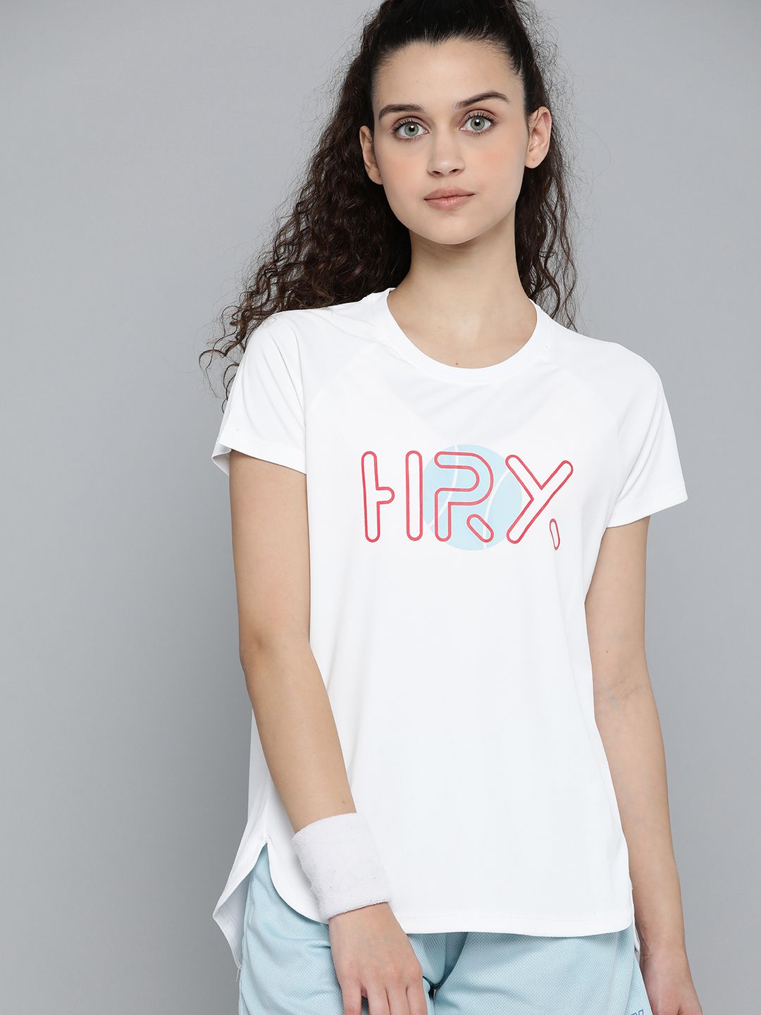 HRX By Hrithik Roshan Women Optic White Solid Rapid-Dry Anti-Static Antimicrobial Racketsport Tshirt Price in India