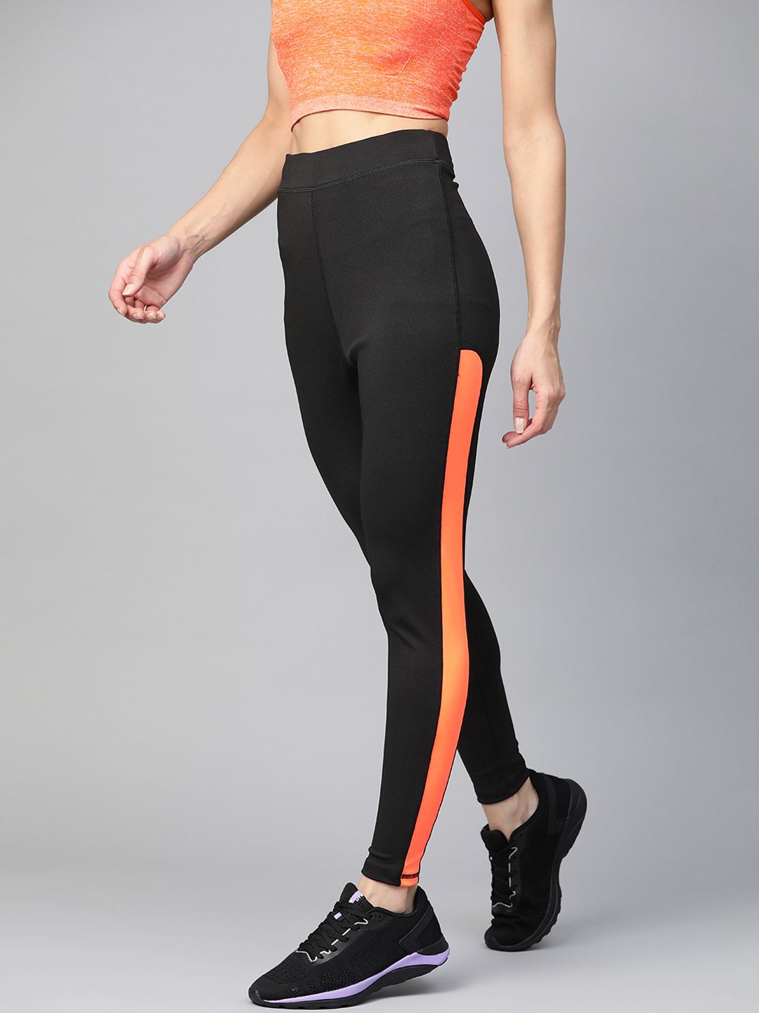 M7 by Metronaut Women Black & Orange Solid Stretchable Training Tights Price in India