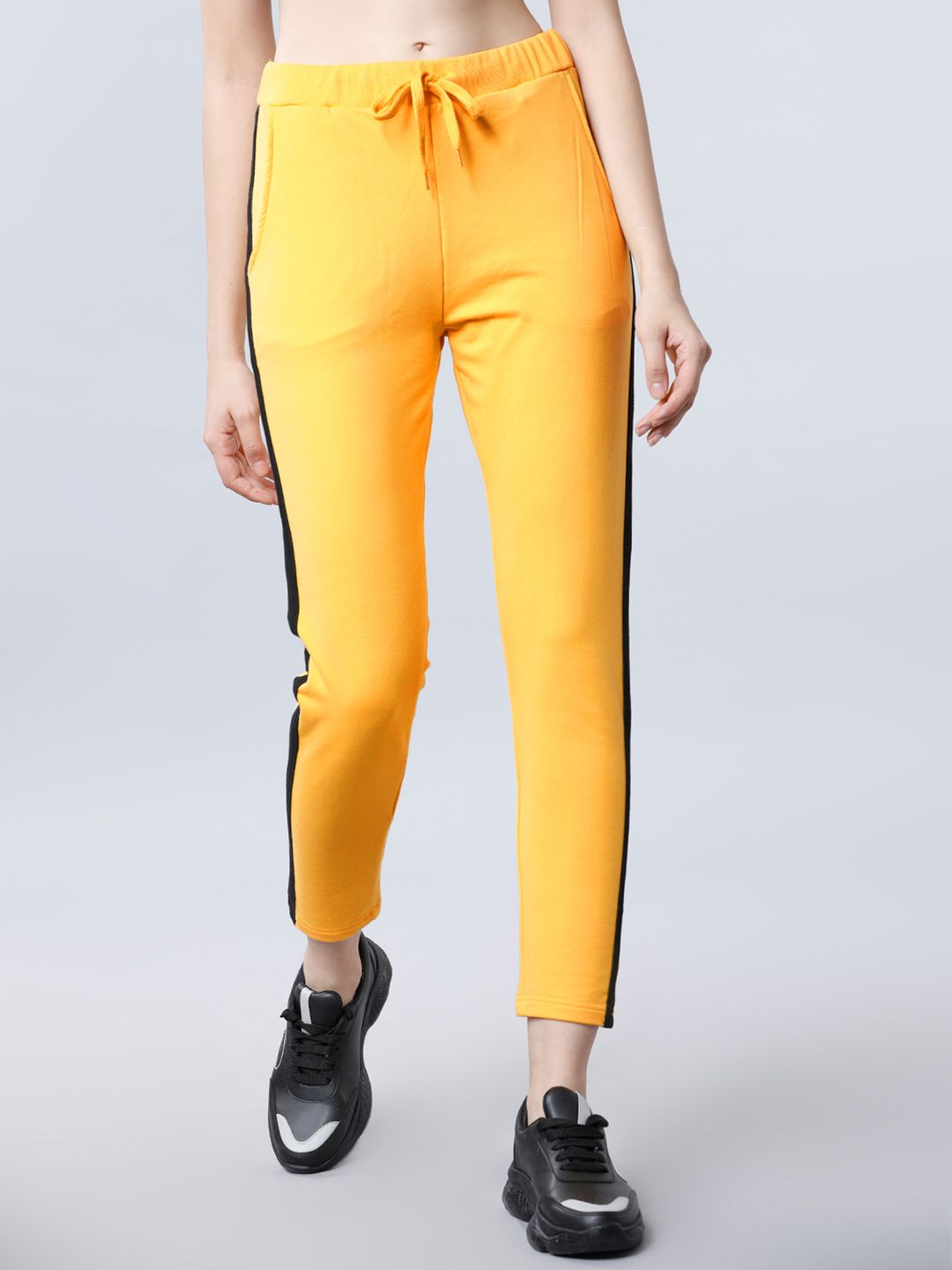 Tokyo Talkies Women Yellow Solid Slim Fit Track Pants Price in India