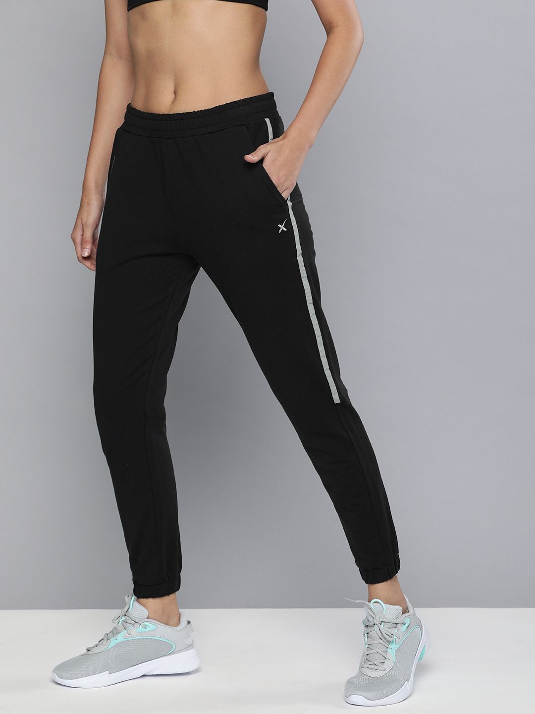 HRX By Hrithik Roshan Women Jet Black Solid Slim Fit Lycra Rapid-Dry Antimicrobial Training Joggers Price in India