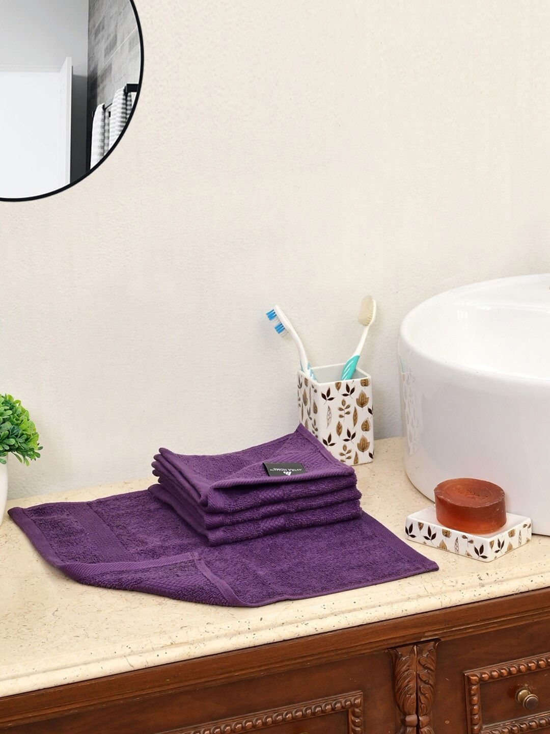 AVI Living Set Of 4 Purple Solid 550 GSM Face Towels Price in India