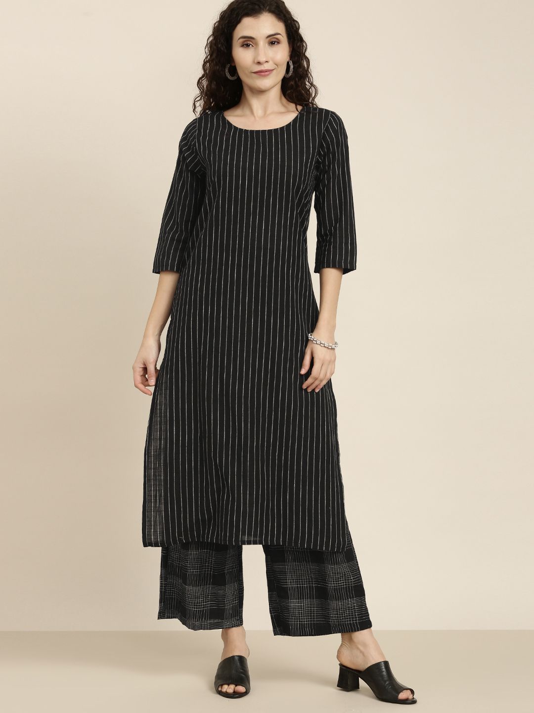 Vishudh Women Black & Off-White Striped Kurta with Palazzos Price in India