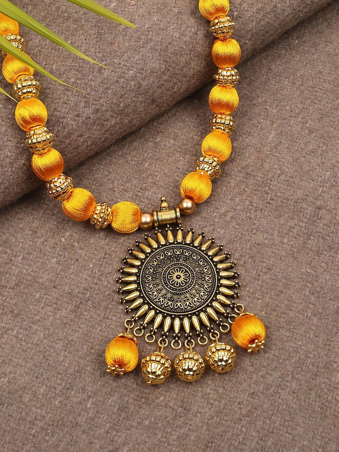 AKSHARA Yellow & Gold-Toned Beaded Brass Necklace Price in India